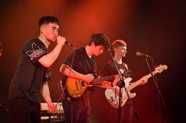 the roster press photo for masquerade