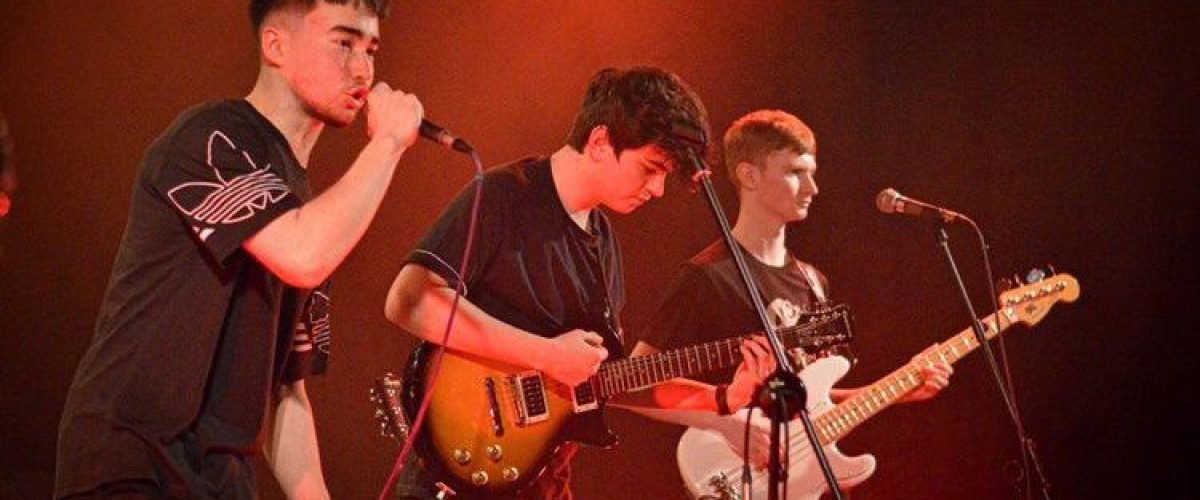 the roster press photo for masquerade